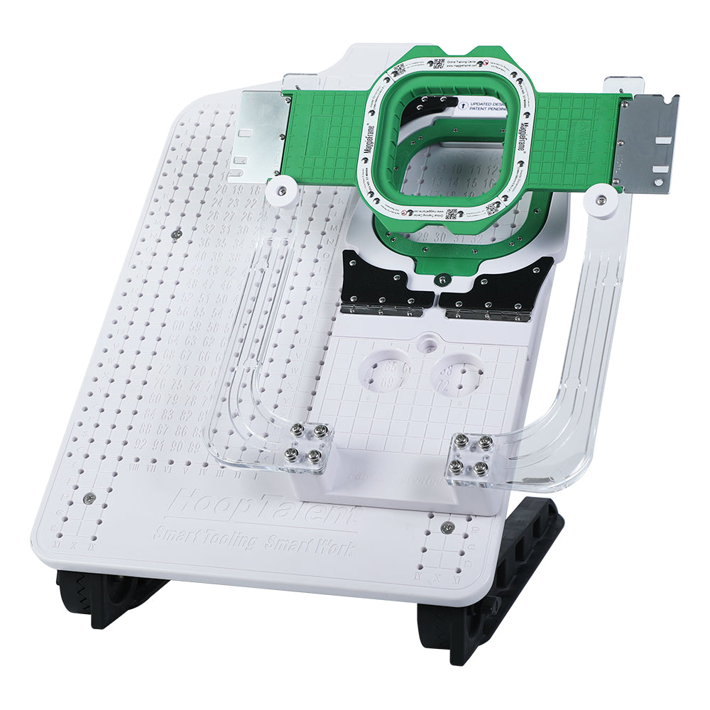 Green 3.9-inch magnetic embroidery hoop mounted on a HoopTalent hooping station with the 0404 fixture
